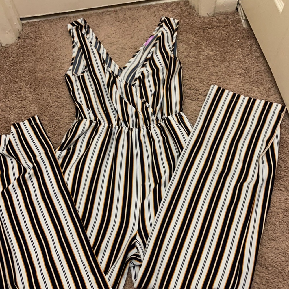 One piece with mustard yellow and black and white stripes size Large